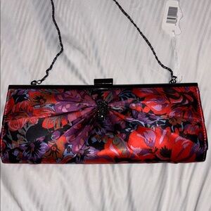 DUNE BRAND RED BLACK FLORAL SATIN CLITCH WITH BLING ADORNMENT SNAP CLOSURE
